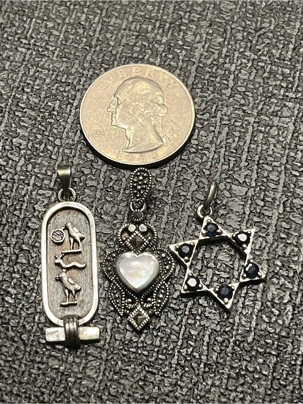 Three 925 pendants